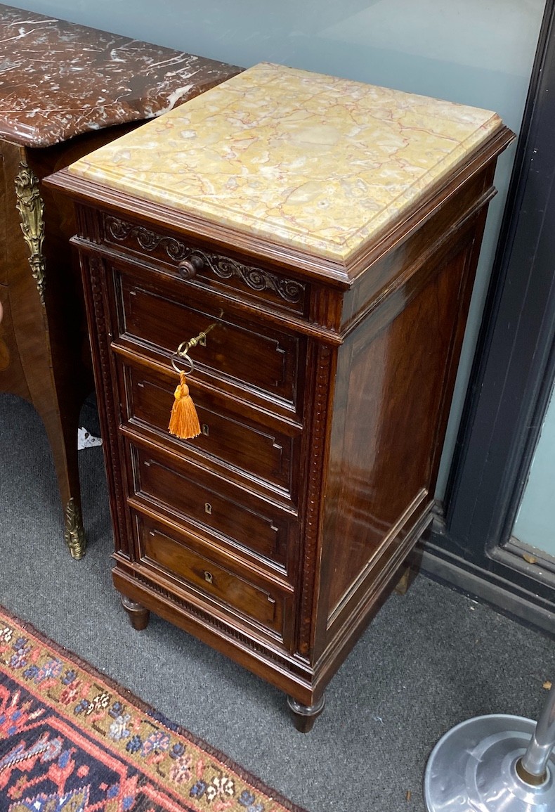 A pair of early 20th century French rosewood five drawer marble top bedside cabinets, width 39cm, depth 40cm, height 83cm.